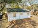 Backyard view showing greenery, landscape cover, and the building's rear exterior at 706 White Oak Dr, Charleston, SC 29407