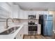 Well-equipped kitchen with quartz countertops, modern appliances, and a stainless steel sink at 706 White Oak Dr, Charleston, SC 29407