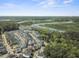 Community featuring many homes and water features viewed from above at 7101 Bowen Corner Ave, Hanahan, SC 29410