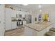 Modern kitchen with stainless steel appliances, granite countertops, and a central island with seating at 7101 Bowen Corner Ave, Hanahan, SC 29410