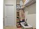 View of shelving with clothing and boxes in a storage area at 7101 Bowen Corner Ave, Hanahan, SC 29410