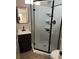Modern bathroom featuring a glass enclosed shower, vanity, and mirror at 78 Hannibal Trl, Ridgeville, SC 29472