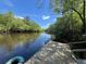Dock on the river, inviting peaceful moments and easy access to waterfront activities at 78 Hannibal Trl, Ridgeville, SC 29472