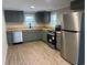 Updated kitchen featuring modern appliances, stylish counters and cabinets at 78 Hannibal Trl, Ridgeville, SC 29472
