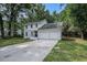 Charming two-story home with white painted brick and an attached two-car garage at 7993 Malden Ave, North Charleston, SC 29420