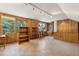 Bonus room featuring wood walls, natural light, and plenty of space for hobbies or storage at 810 Creekside Dr, Mount Pleasant, SC 29464