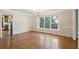 Bright dining room with hardwood floors and natural light from large window at 810 Creekside Dr, Mount Pleasant, SC 29464