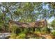 Lovely home featuring mature trees, lush greenery, and a well-maintained exterior at 810 Creekside Dr, Mount Pleasant, SC 29464
