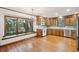 Cozy kitchen with custom wood cabinets and a large window at 810 Creekside Dr, Mount Pleasant, SC 29464