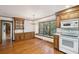Eat-in kitchen with hardwood floors and plentiful custom wood storage at 810 Creekside Dr, Mount Pleasant, SC 29464