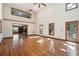 Spacious living room with hardwood floors, high ceilings, and multiple windows offering natural light at 810 Creekside Dr, Mount Pleasant, SC 29464
