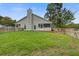 Large backyard and deck area with a screened porch at 8524 Brookforest Dr, Charleston, SC 29406