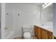 Bright bathroom with dual sinks, vanity and shower over tub at 8524 Brookforest Dr, Charleston, SC 29406