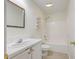 Bathroom featuring a vanity with a white sink and a shower-tub combo and tiled flooring at 8524 Brookforest Dr, Charleston, SC 29406