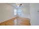 Bedroom features hardwood floors and double windows providing lots of light at 8524 Brookforest Dr, Charleston, SC 29406