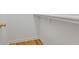 Walk-in closet features wood floor, white walls, shelving and rack at 8524 Brookforest Dr, Charleston, SC 29406