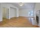 Spacious living room with hardwood floors, fireplace, neutral walls, and access to the outdoor space at 8524 Brookforest Dr, Charleston, SC 29406