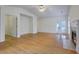 Bright living room with hardwood floors, fireplace, neutral walls, and access to the outdoor space at 8524 Brookforest Dr, Charleston, SC 29406