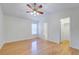 Spacious main bedroom with hardwood floors, vaulted ceilings, ceiling fan, window and closet at 8524 Brookforest Dr, Charleston, SC 29406