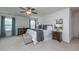 This bedroom features a large bed, a ceiling fan and a dresser with mirrors at 9767 Black Willow Ln, Ladson, SC 29456
