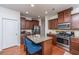 Spacious kitchen features stainless steel appliances, granite countertops, and ample cabinet space at 9767 Black Willow Ln, Ladson, SC 29456