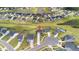 Aerial view of a residential neighborhood with houses surrounding a cul-de-sac at 102 Bolsena Ct, Summerville, SC 29486