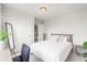 Well-lit bedroom showcases a cozy bed, neutral tones, and minimalist decor with view to closet at 102 Bolsena Ct, Summerville, SC 29486