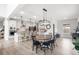 Open-concept layout features a dining area adjacent to a modern kitchen at 102 Bolsena Ct, Summerville, SC 29486