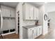 Mudroom features custom cabinets, counter space, and a convenient bench with storage baskets at 102 Bolsena Ct, Summerville, SC 29486