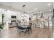 Open floor plan with dining area seamlessly connects to the kitchen and living room at 102 Bolsena Ct, Summerville, SC 29486