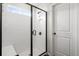 Modern bathroom featuring a glass shower with white subway tile and a built-in shower bench at 102 Bolsena Ct, Summerville, SC 29486