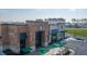Aerial view of a Starbucks with outdoor seating, modern architecture, and ample parking at 102 Bolsena Ct, Summerville, SC 29486