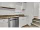 Kitchenette with stainless steel appliances, white cabinetry, and a speckled countertop at 105 Evatt Dr, Goose Creek, SC 29445