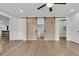 Spacious main bedroom with sliding barn doors to bathroom at 105 Evatt Dr, Goose Creek, SC 29445