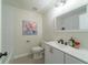 Bright bathroom with white subway tile, modern fixtures, and neutral colored walls at 106 Kent Cir, Ladson, SC 29456