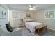 Cozy bedroom with stylish decor, wood floors, and a well-lit ambiance creating a relaxing retreat at 106 Kent Cir, Ladson, SC 29456