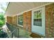 Inviting front porch with brick facade, and a welcoming 'Welcome' mat at 106 Kent Cir, Ladson, SC 29456