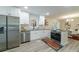 Modern kitchen featuring stainless steel appliances, granite countertops, and white cabinetry at 106 Kent Cir, Ladson, SC 29456