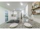 Granite countertops and an electric cooktop add convenience to this modern kitchen at 106 Kent Cir, Ladson, SC 29456