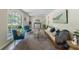 Bright living room featuring stylish decor, hardwood floors, and abundant natural light at 106 Kent Cir, Ladson, SC 29456