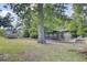A spacious backyard features a private boat dock along the river, adding waterfront allure to the property at 108 Mourning Dove Dr, Bonneau, SC 29431