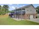 Well maintained two-story home with a large garage and a second story deck at 108 Mourning Dove Dr, Bonneau, SC 29431