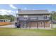 Two-story home with large, grassy yard and extended driveway at 108 Mourning Dove Dr, Bonneau, SC 29431