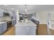 A modern kitchen features a large island with seating and stainless steel appliances at 108 Mourning Dove Dr, Bonneau, SC 29431