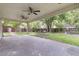 Covered outdoor patio that features a brick pathway leading to a garden at 108 Williamsburg Ct, Goose Creek, SC 29445