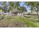 Landscaped backyard with a brick pathway and a hammock at 108 Williamsburg Ct, Goose Creek, SC 29445