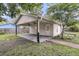 Spacious backyard with a covered patio, perfect for outdoor entertaining at 108 Williamsburg Ct, Goose Creek, SC 29445