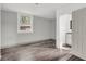Cozy bedroom with wood floors and a glimpse into an ensuite bathroom at 108 Williamsburg Ct, Goose Creek, SC 29445