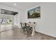 Cozy dining room with seating for four and view into an adjacent living area at 108 Williamsburg Ct, Goose Creek, SC 29445