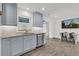 Charming kitchen with stainless steel appliances, and an adjacent dining area with seating for four at 108 Williamsburg Ct, Goose Creek, SC 29445